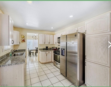 7842 W Gilmore Avenue - Photo Thumbnail 7