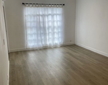 1254 N Orange Grove Avenue - Photo Thumbnail 4