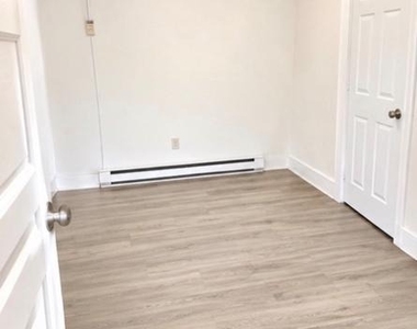 209 S West Street - Photo Thumbnail 3
