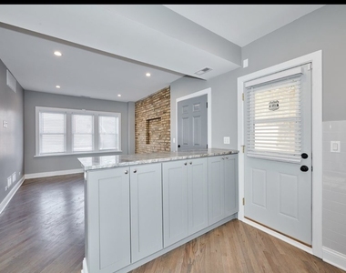 5703 W Seminole Street - Photo Thumbnail 8