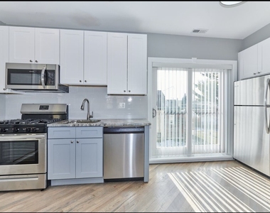 5703 W Seminole Street - Photo Thumbnail 4