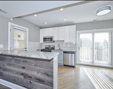 5703 W Seminole Street - Photo Thumbnail 5