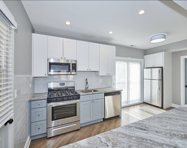 5703 W Seminole Street - Photo Thumbnail 6
