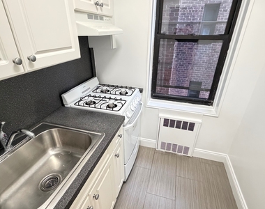 34-21 77th Street - Photo Thumbnail 4
