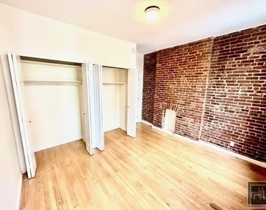 East 84 Street - Photo Thumbnail 1