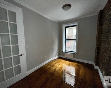 E 13th St. - Photo Thumbnail 2
