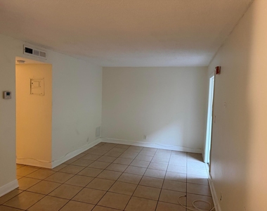 1151 Ne 16th Court - Photo Thumbnail 3