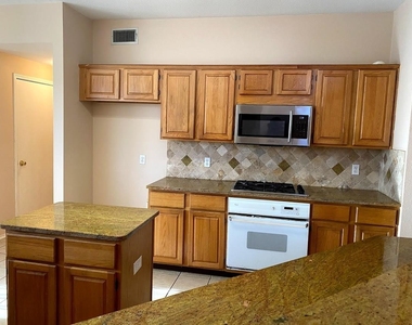 7105 Tansy Place - Photo Thumbnail 4