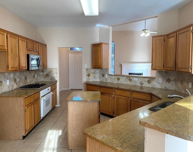 7105 Tansy Place - Photo Thumbnail 3