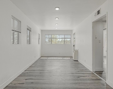 124 S Almont Drive - Photo Thumbnail 2