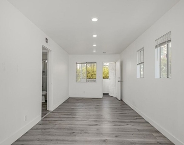 124 S Almont Drive - Photo Thumbnail 1