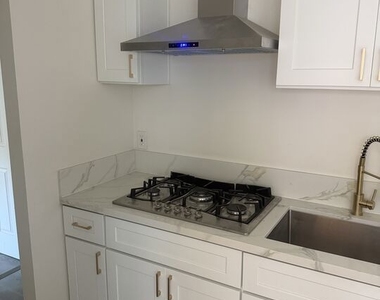 1201 E 20th Street - Photo Thumbnail 4