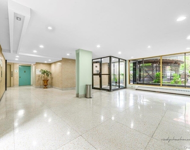 65-50 Wetherole Street - Photo Thumbnail 2