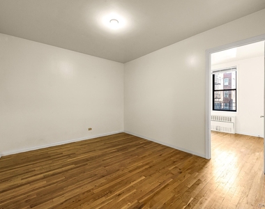 65-50 Wetherole Street - Photo Thumbnail 5