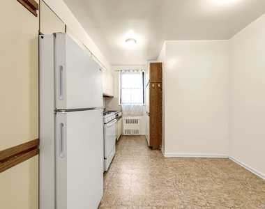 65-50 Wetherole Street - Photo Thumbnail 11