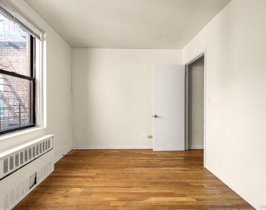 65-50 Wetherole Street - Photo Thumbnail 8