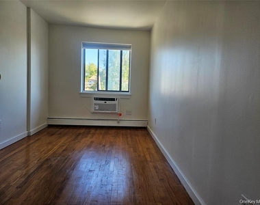 39-22 211th Street - Photo Thumbnail 6