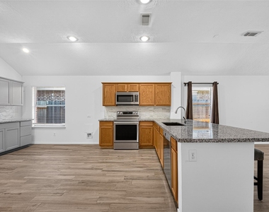 10627 Saratoga Square - Photo Thumbnail 14