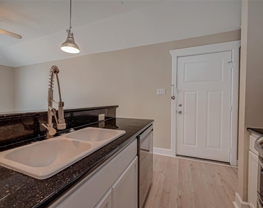 1110 E 24th Street - Photo Thumbnail 7