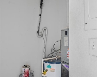 9105 W Hillsborough Avenue - Photo Thumbnail 6
