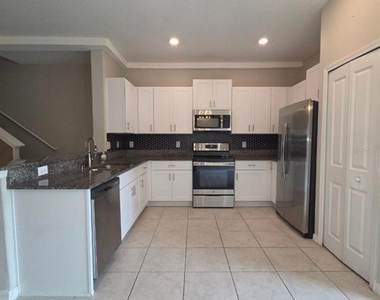9659 Pembrooke Pines Drive - Photo Thumbnail 2
