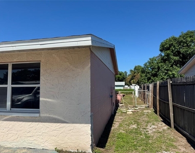 5821 90th Avenue N - Photo Thumbnail 1