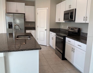 15713 Fort Island Place - Photo Thumbnail 6