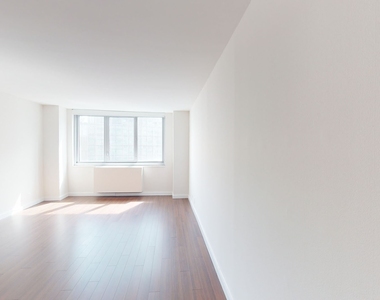 401 E 34th St - Photo Thumbnail 1