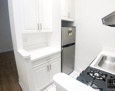 East 83 Street - Photo Thumbnail 2