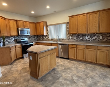 8811 W Nicolet Avenue - Photo Thumbnail 9