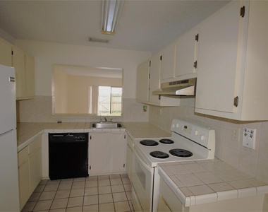 9477 Palm Circle N - Photo Thumbnail 9