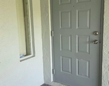 1002 Green Pine Boulevard - Photo Thumbnail 2
