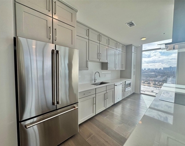 6911 Cowboys Way - Photo Thumbnail 1