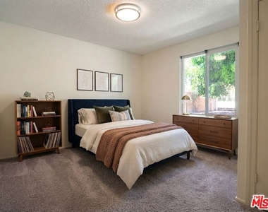 10933 Wellworth Avenue - Photo Thumbnail 3