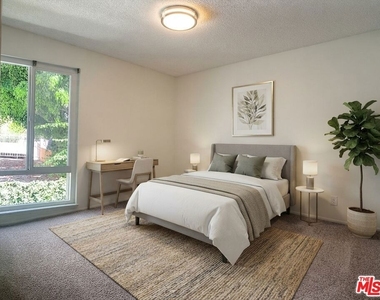 10933 Wellworth Avenue - Photo Thumbnail 2