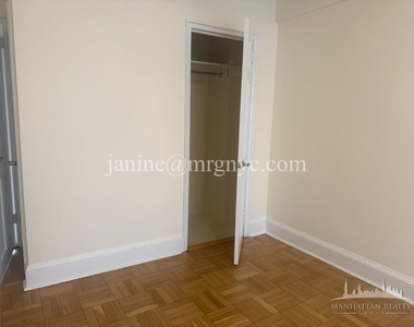 E 56th St - Photo Thumbnail 7