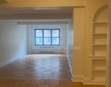 E 56th St - Photo Thumbnail 5