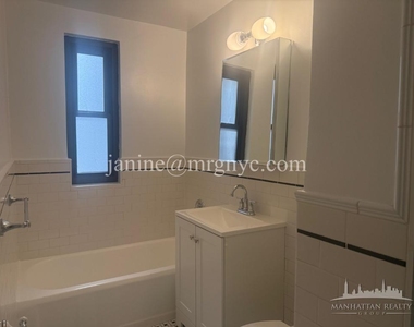 E 56th St - Photo Thumbnail 2