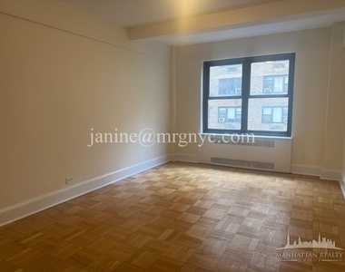 E 56th St - Photo Thumbnail 3