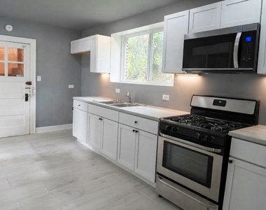 1133 E 81st Place - Photo Thumbnail 4