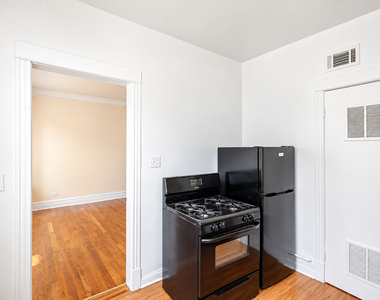 2404 W 63rd Street - Photo Thumbnail 1