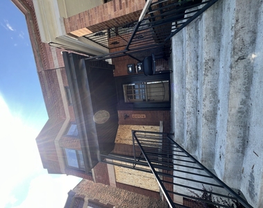 6804 S Champlain Avenue - Photo Thumbnail 1