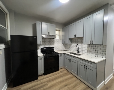 6804 S Champlain Avenue - Photo Thumbnail 2