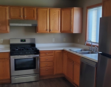 703b Burgess Drive - Photo Thumbnail 1