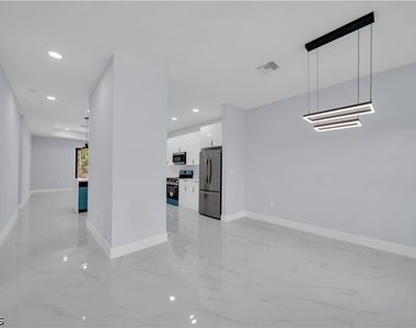 1009 Moore Avenue - Photo Thumbnail 1