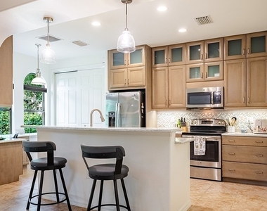 9077 Capistrano Street N - Photo Thumbnail 10