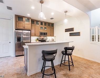 9077 Capistrano Street N - Photo Thumbnail 11