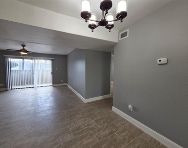 8421 Hearth Drive - Photo Thumbnail 2