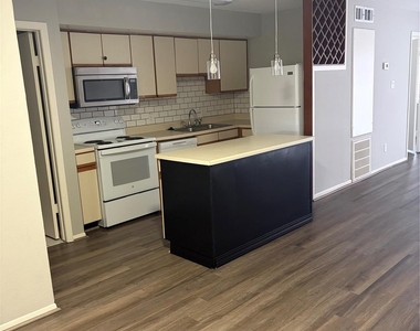 6107 Snug Harbor Drive - Photo Thumbnail 1