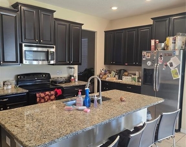 1215 Ballard Green Place - Photo Thumbnail 6